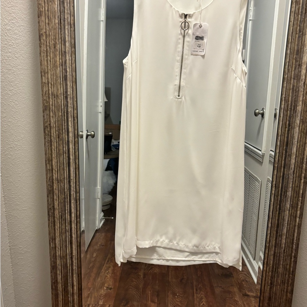 Naked Zebra White Textile with Zebra Design. Dress is lined